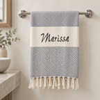 Gray herringbone Turkish towel embroidered with Marissa